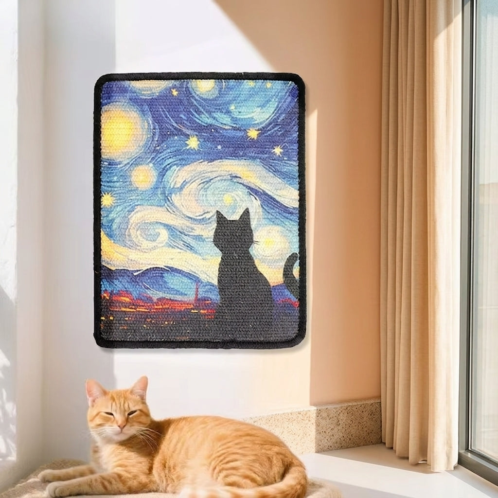A rectangular wall cat scratcher art piece featuring a stylized cat silhouette against a swirling blue and yellow starry sky, hung on a beige wall above an orange tabby cat lying on a windowsill in an indoor setting.