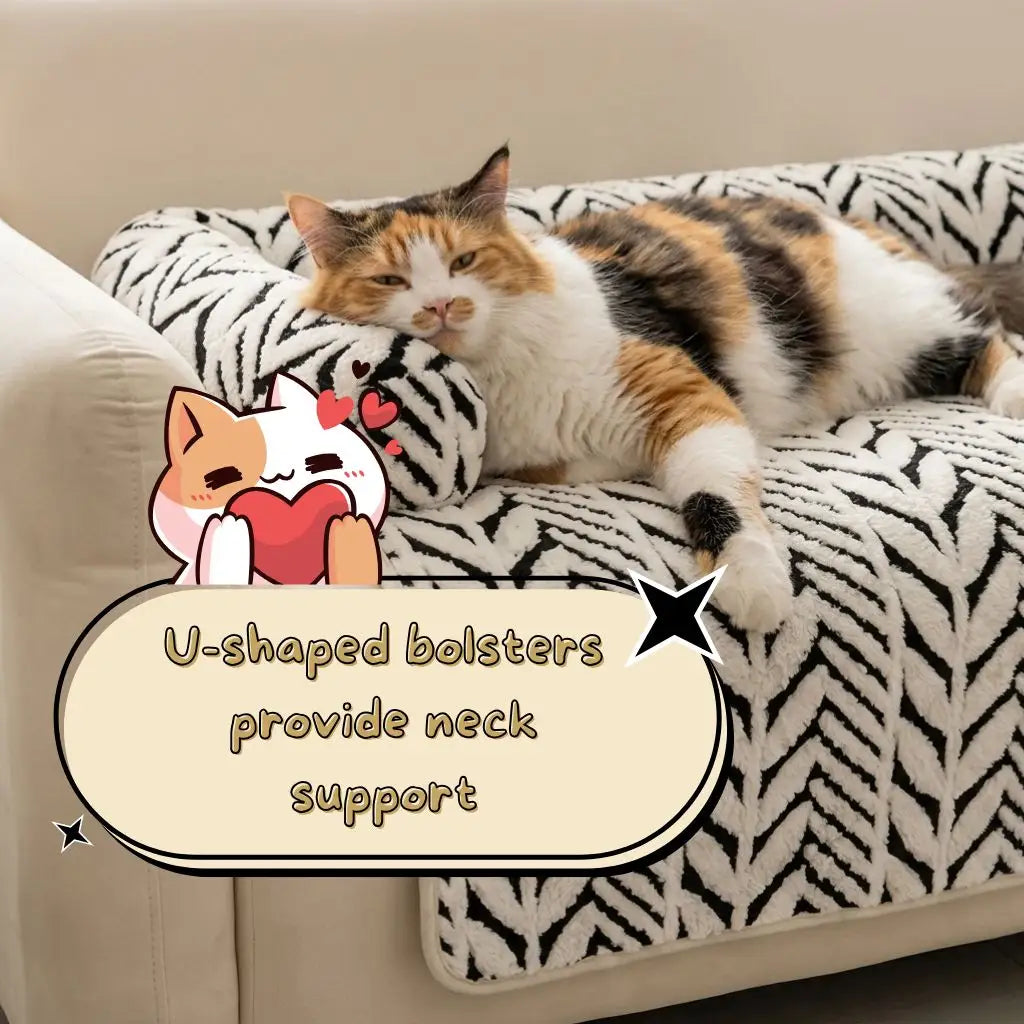 A calico cat lies on a patterned U-shaped sofa cushion, with an overlaid graphic showing a cartoon cat holding a red heart and the text 'U-shaped bolsters provide neck support.'.